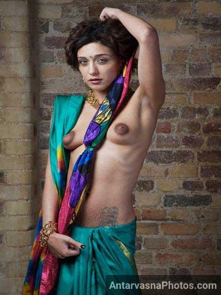 Attractive Indian girl with petite bust in traditional attire