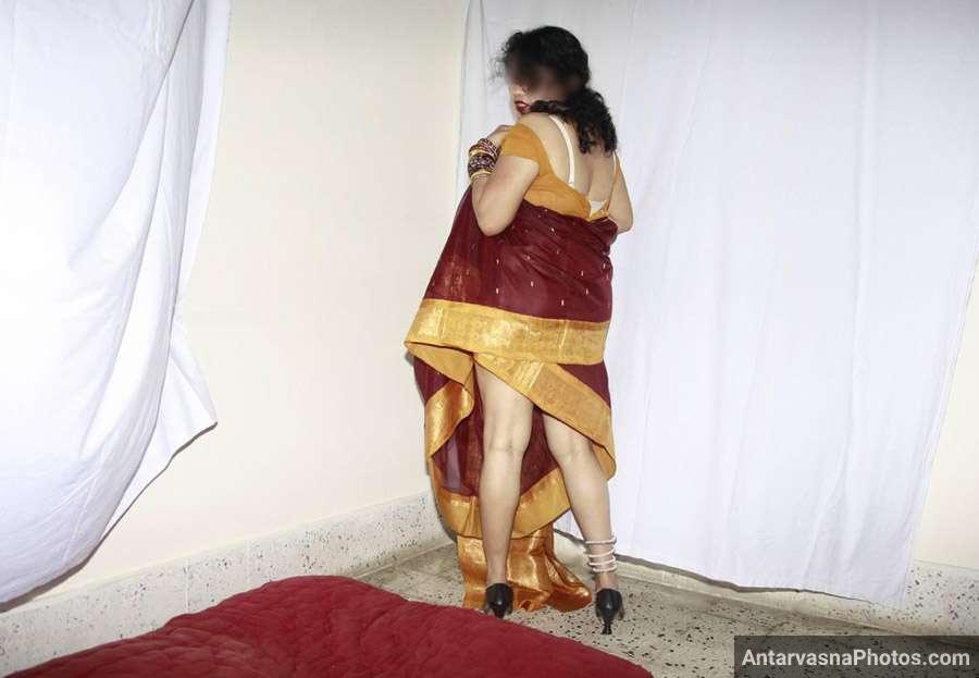https://pub-5fcdf72a54cd4edbb03ec3edaa415a42.r2.dev/nakedleaks/aunty's_unveiled_photos_at_wedding_by_opening_saree/2.jpg
