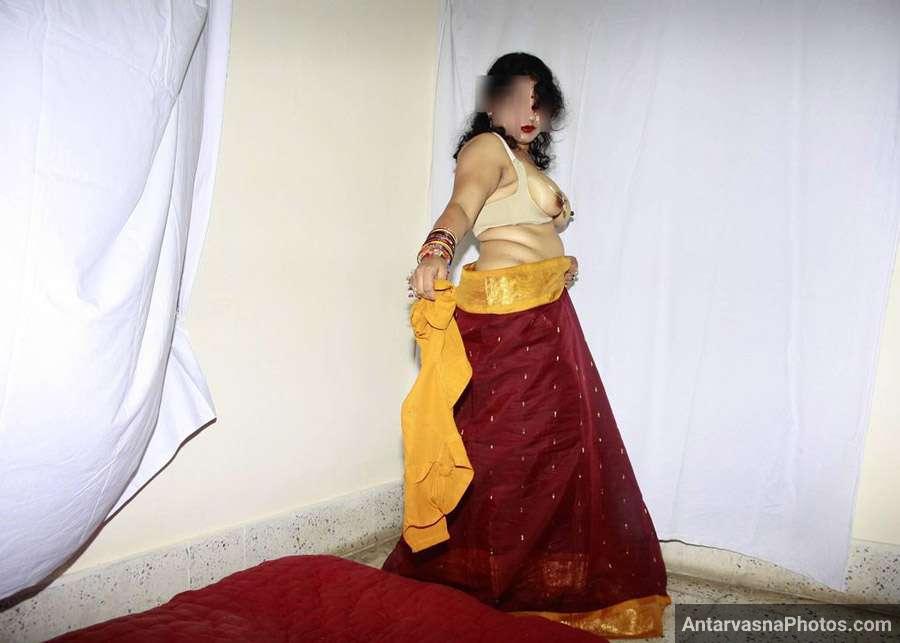 https://pub-5fcdf72a54cd4edbb03ec3edaa415a42.r2.dev/nakedleaks/aunty's_unveiled_photos_at_wedding_by_opening_saree/8.jpg