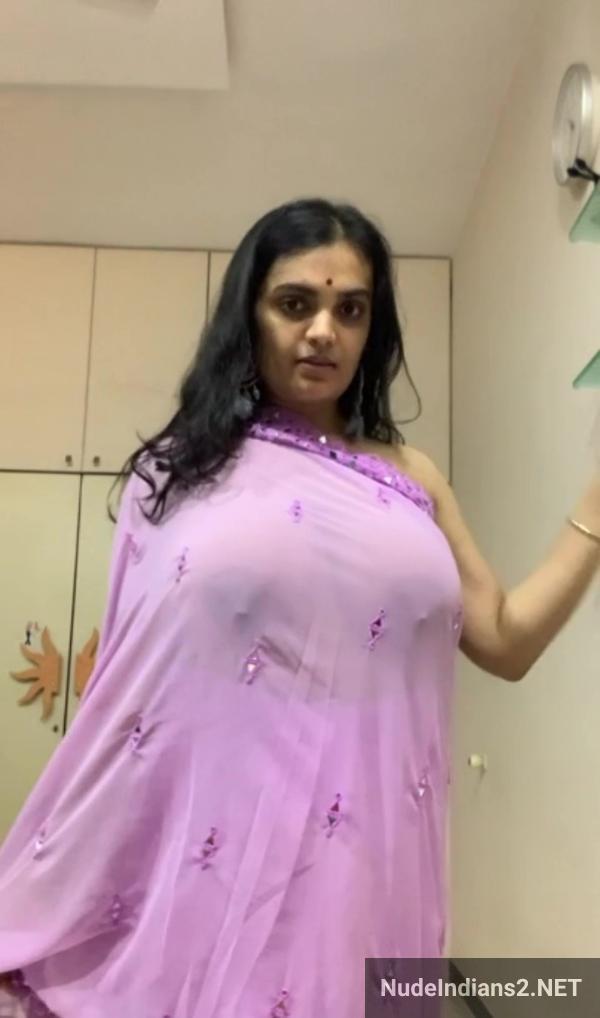 https://pub-5fcdf72a54cd4edbb03ec3edaa415a42.r2.dev/nakedleaks/bangalore_woman_rupa's_large_milk_containers_in_revealing_traditional_attire/2.jpg