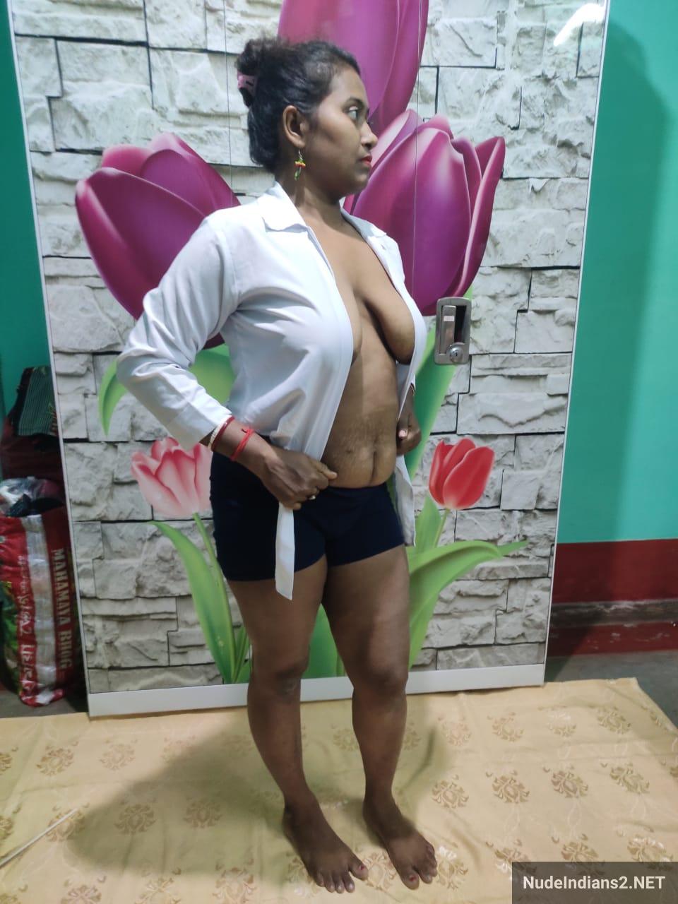 https://pub-5fcdf72a54cd4edbb03ec3edaa415a42.r2.dev/nakedleaks/captivating_kolkata_bengali_boudi_simraan_poses_seductively_in_stylish_attire/10.jpg