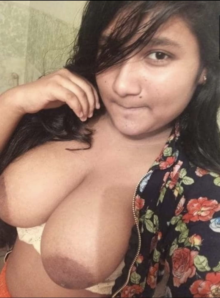 College Girl Captures Selfies of Her Boobs in Photos