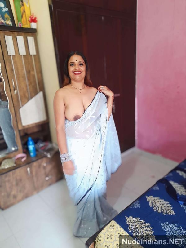 Indian saree woman exposed – Busty lady flaunts in desi attire