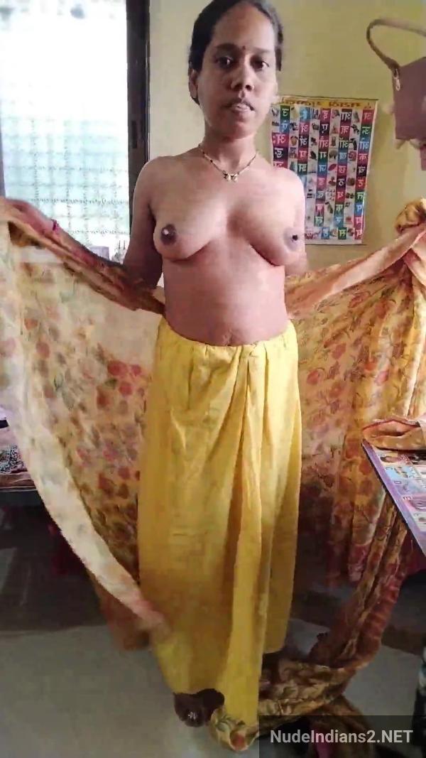 https://pub-5fcdf72a54cd4edbb03ec3edaa415a42.r2.dev/nakedleaks/marathi_woman_urmila_salvi's_sensual_saree_strip_and_erotic_display/16.jpg