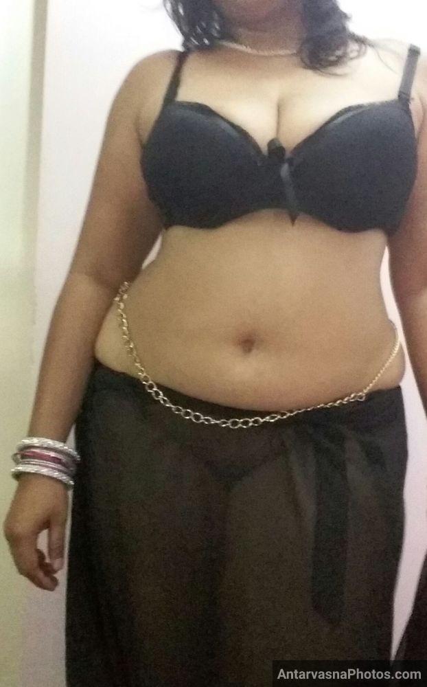 https://pub-5fcdf72a54cd4edbb03ec3edaa415a42.r2.dev/nakedleaks/nisha_aunty_reveals_stunning_figure_in_black_saree/8.jpg