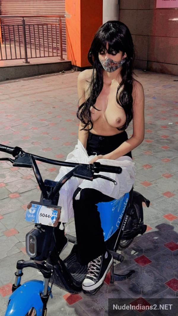 https://pub-5fcdf72a54cd4edbb03ec3edaa415a42.r2.dev/nakedleaks/sensual_gamer_nisha_rani's_risqué_urban_display/66.jpg