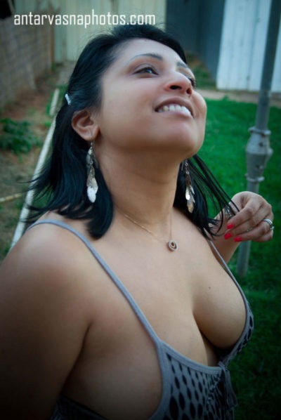 Sensual photographs of voluptuous Indian girl's large bust