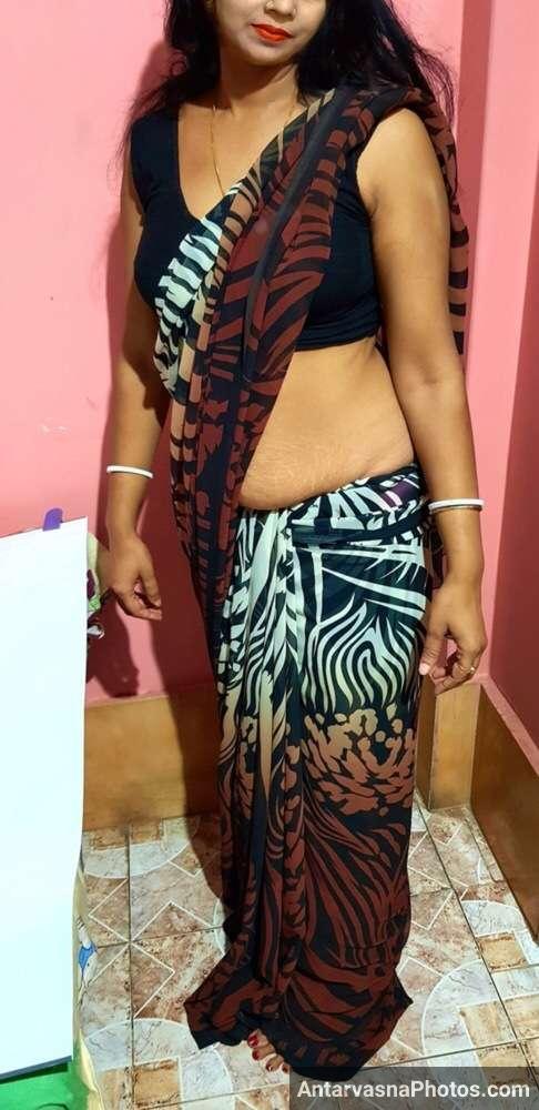 https://pub-5fcdf72a54cd4edbb03ec3edaa415a42.r2.dev/nakedleaks/sensuous_striptease_images_of_a_gujarati_woman_in_a_saree/1.jpg