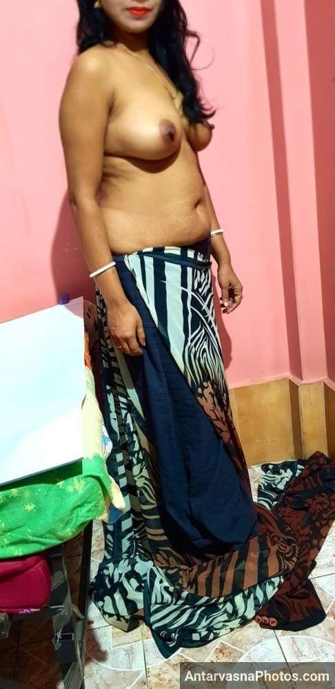 https://pub-5fcdf72a54cd4edbb03ec3edaa415a42.r2.dev/nakedleaks/sensuous_striptease_images_of_a_gujarati_woman_in_a_saree/2.jpg